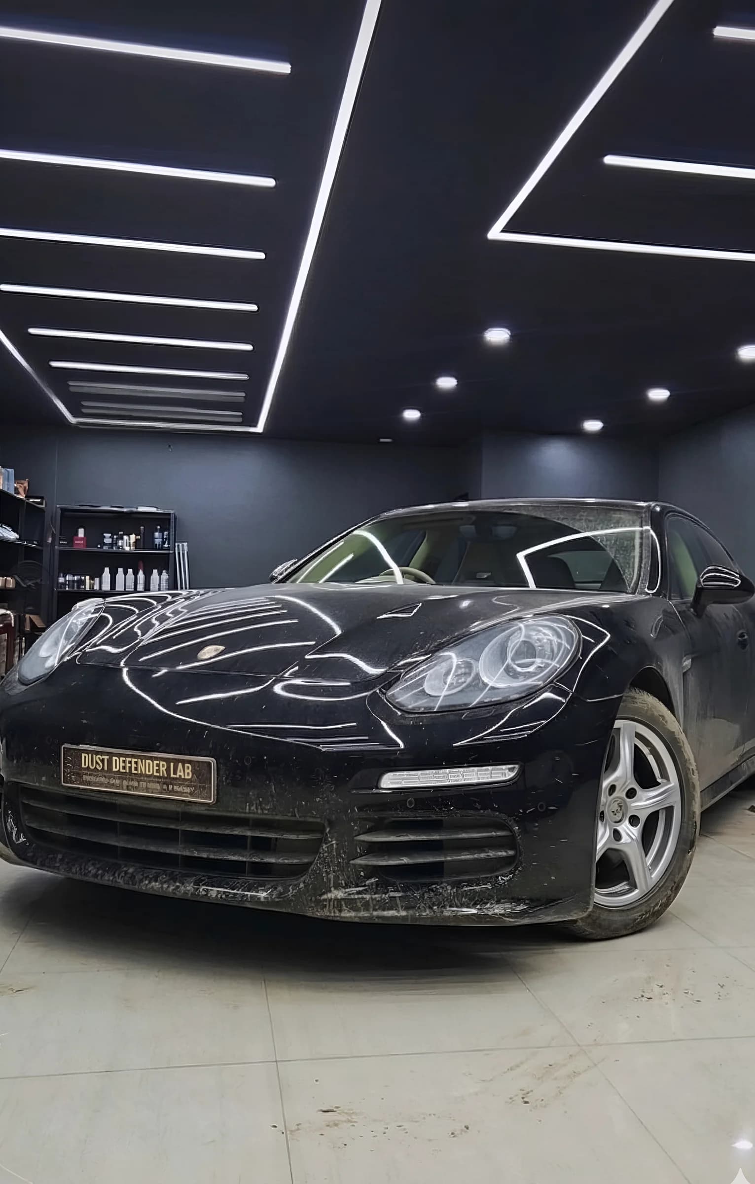 Dirty Porsche Panamera arriving at Dust Defender Lab for detailing